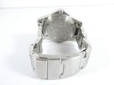a watch that is sitting on a white surface
