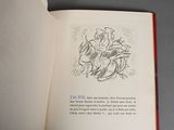 an open book with a drawing of a man riding a horse