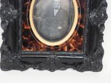 a picture of a man in a suit and tie in a picture frame