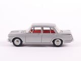 a toy car that is sitting on a white surface