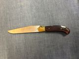 a knife that is sitting on top of a table