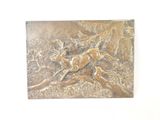 a metal plaque with a picture of a deer on it