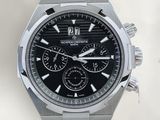 a close up of a watch with a black face