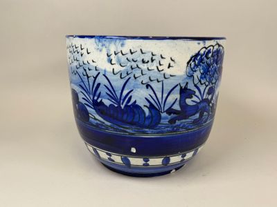 un bol bleu et blanc orné d'un motif