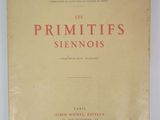 the front cover of a book with red writing on it