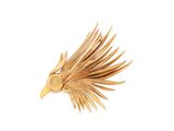 yellow gold plated brooch of a bird made of palm leaves