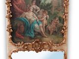 un miroir sur lequel est peinte une image et un miroir sur lequel est représentée une image