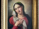 an old painting of a woman with a scarf in a gold frame