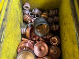 a yellow box filled with lots of different types of metal