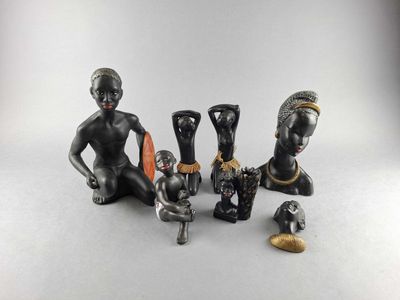 a group of figurines that are sitting on a table