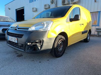 yellow citrole van parked in front of a building in a parking lot