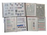 many different types of stamps on the pages of a book