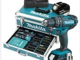 a close up of a cordless drill and a tool case