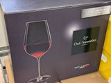 a box with a wine glass inside of it