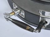 a metal case with a handle and a lock on it