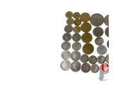 a lot of coins that are on a white surface