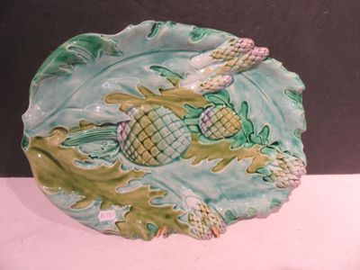 a plate with a pineapple on it on a table