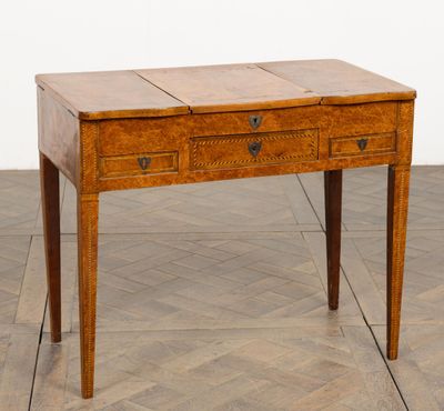 an image of a wooden desk with drawers on it