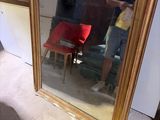 a man taking a picture of himself in a mirror