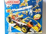 toy cars are in a box on a white surface