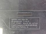 a close up of a piece of metal with a label on it