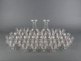 a lot of empty wine glasses sitting on a table