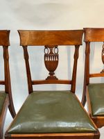QUATORZE CHAISES en acajou, le dossier à décor de vases, gar… (photo 2)