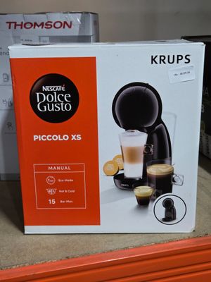 a box of coffee that is on the shelf