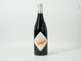 a bottle of wine that is sitting on a table