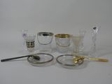 a lot of glass items that are on the table