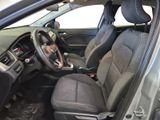 the interior of a car with a steering wheel and a dashboard