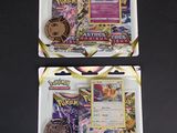 deux paquets de cartes à collectionner Pokémon posés sur une surface noire