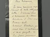 a piece of paper with a handwritten letter on it