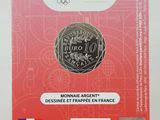 french coin with the image of a woman on the front of it