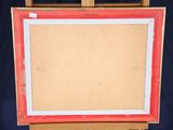 an old wooden easel with a painting on it and a blue background