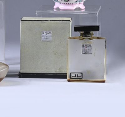 several different types of perfumes are displayed in a display case