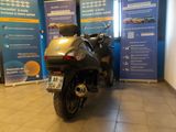 a motorcycle that is parked in a showroom