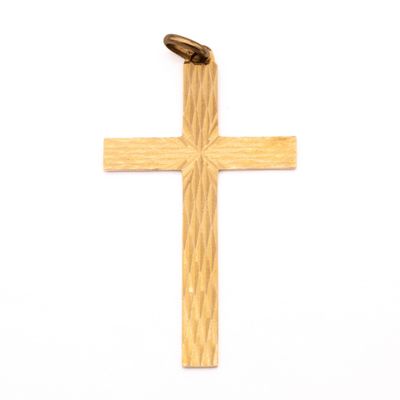 wooden cross on a white background with a bullet in the middle of the cross