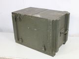 a green box sitting on a white surface