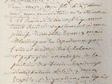 une lettre écrite à l'encre noire sur une feuille de papier