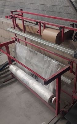 a machine that has a roll of paper on it