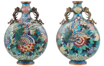 pair of chinese cloise vases with birds and flowers painted on them