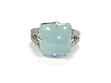 an image of a ring with a blue stone on top of it