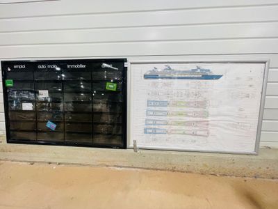 a picture of a wall mounted mailbox with a map on it
