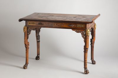 a small table with a wooden top on a white background