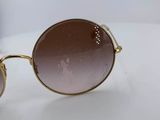 a close up of a pair of sunglasses on a table