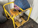 a small yellow cart with a helmet on top of it
