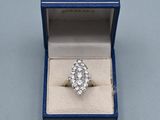 an image of a diamond ring in a blue box