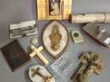 a lot of religious items that are on a table