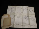une vieille carte représentant une rivière et une carte d'une ville